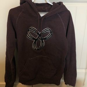 Burgundy TNA hoodie.